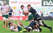7 April 2024; Denis Buckley of Connacht is tackled by Thibaut Hamonou of Section Paloise during the Challenge Cup Round of 16 match between Section Paloise and Connacht at Stade du Hameau in Pau, France. Photo by Loic Cousin/Sportsfile