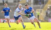 7 April 2024; Killian Brady of Cavan in action against Kevin Loughran of Monaghan during the Ulster GAA Football Senior Championship preliminary round match between Monaghan and Cavan at St Tiernach's Park in Clones, Monaghan. Photo by Daire Brennan/Sportsfile