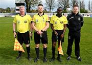 7 April 2024; Match officials, from left, assistant referee Paul Malone, referee Dean Stenson, assistant referee Victor Oladapo, and fourth official Sean Finn after the FAI Under 17 Cup final match between Malahide United and Peamount United at Whitehall Stadium in Dublin. Photo by Seb Daly/Sportsfile
