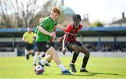7 April 2024; Ciarán Gilmore of Peamount United in action against Fremid Wadon of Malahide United during the FAI Under 17 Cup final match between Malahide United and Peamount United at Whitehall Stadium in Dublin. Photo by Seb Daly/Sportsfile