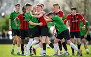 7 April 2024; Pierce Walsh of Malahide United tussles with Peamount United players Cillian Behan, left, and Calum Casey during the FAI Under 17 Cup final match between Malahide United and Peamount United at Whitehall Stadium in Dublin. Photo by Seb Daly/Sportsfile