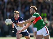 7 April 2024; Aidan O'Shea of Mayo in action against Tadhg O'Riordan of New York during the Connacht GAA Football Senior Championship quarter-final match between New York and Mayo at Gaelic Park in New York, USA. Photo by Sam Barnes/Sportsfile