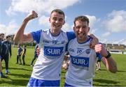 7 April 2024; Waterford players Stephen Curry, left, and Conor O' Cuirrín celebrate after their side's victory in the Munster GAA Football Senior Championship quarter-final match between Waterford and Tipperary at Fraher Field in Dungarvan, Waterford. Photo by Michael P Ryan/Sportsfile