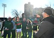 7 April 2024; Paddy Durcan of Mayo poses for photographs with supporters after the Connacht GAA Football Senior Championship quarter-final match between New York and Mayo at Gaelic Park in New York, USA. Photo by Sam Barnes/Sportsfile