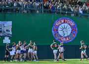 7 April 2024; Players from both sides tussle off the ball during the Connacht GAA Football Senior Championship quarter-final match between New York and Mayo at Gaelic Park in New York, USA. Photo by Sam Barnes/Sportsfile