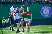 7 April 2024; Aidan O'Shea of Mayo and Pierce Lillis of New York tussle off the ball during the Connacht GAA Football Senior Championship quarter-final match between New York and Mayo at Gaelic Park in New York, USA. Photo by Sam Barnes/Sportsfile