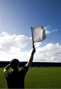 7 April 2024; Linesman Jermone Henry holds his flag aloft during the Leinster GAA Football Senior Championship Round 1 match between Longford and Meath at Glennon Brothers Pearse Park in Longford. Photo by Ray McManus/Sportsfile