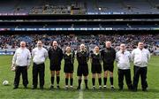 7 April 2024; Referee Gus Chapman and his match officials before the Lidl LGFA National League Division 1 final match between Armagh and Kerry at Croke Park in Dublin. Photo by Piaras Ó Mídheach/Sportsfile