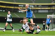 8 April 2024; Denise O'Sullivan is tackled by Ruesha Littlejohn during a Republic of Ireland Women's training session at the Aviva Stadium in Dublin. Photo by Stephen McCarthy/Sportsfile