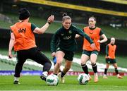 8 April 2024; Emily Murphy in action against Aoife Mannion, left, and Lucy Quinn during a Republic of Ireland Women's training session at the Aviva Stadium in Dublin. Photo by Stephen McCarthy/Sportsfile
