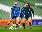 8 April 2024; Denise O'Sullivan in action against Tyler Toland during a Republic of Ireland Women's training session at the Aviva Stadium in Dublin. Photo by Stephen McCarthy/Sportsfile