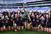 7 April 2024; Kildare goalkeeper Mary Hulgraine holds the cup aloft as she celebrates with team-mates after their side's victory in the Lidl LGFA National League Division 2 final match between Kildare and Tyrone at Croke Park in Dublin. Photo by Piaras Ó Mídheach/Sportsfile