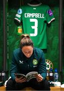 9 April 2024; Megan Campbell of Republic of Ireland reads a match programme in the dressingroom before the UEFA Women's European Championship qualifying group A match between Republic of Ireland and England at Aviva Stadium in Dublin. Photo by Stephen McCarthy/Sportsfile