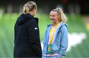 9 April 2024; Chloe Kelly of England, right, and Republic of Ireland assistant coach Emma Byrne before the UEFA Women's European Championship qualifying group A match between Republic of Ireland and England at Aviva Stadium in Dublin. Photo by Stephen McCarthy/Sportsfile