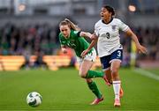 9 April 2024; Jessica Carter of England in action against Heather Payne of Republic of Ireland during the UEFA Women's European Championship qualifying group A match between Republic of Ireland and England at Aviva Stadium in Dublin. Photo by Ben McShane/Sportsfile