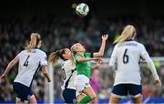 9 April 2024; Denise O'Sullivan of Republic of Ireland in action against Ella Toone of England during the UEFA Women's European Championship qualifying group A match between Republic of Ireland and England at Aviva Stadium in Dublin. Photo by Ramsey Cardy/Sportsfile