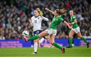 9 April 2024; Lauren Hemp of England in action against Heather Payne of Republic of Ireland during the UEFA Women's European Championship qualifying group A match between Republic of Ireland and England at Aviva Stadium in Dublin. Photo by Ramsey Cardy/Sportsfile