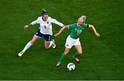 9 April 2024; Denise O'Sullivan of Republic of Ireland in action against Lucy Bronze of England during the UEFA Women's European Championship qualifying group A match between Republic of Ireland and England at Aviva Stadium in Dublin. Photo by Tyler Miller/Sportsfile