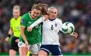 9 April 2024; Alex Greenwood of England in action against Kyra Carusa of Republic of Ireland during the UEFA Women's European Championship qualifying group A match between Republic of Ireland and England at Aviva Stadium in Dublin. Photo by Stephen McCarthy/Sportsfile