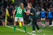 9 April 2024; Republic of Ireland head coach Eileen Gleeson speaks to Kyra Carusa of Republic of Ireland during the UEFA Women's European Championship qualifying group A match between Republic of Ireland and England at Aviva Stadium in Dublin. Photo by Stephen McCarthy/Sportsfile
