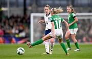 9 April 2024; Keira Walsh of England in action against Denise O'Sullivan of Republic of Ireland during the UEFA Women's European Championship qualifying group A match between Republic of Ireland and England at Aviva Stadium in Dublin. Photo by Ben McShane/Sportsfile