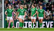 9 April 2024; Republic of Ireland players, from left, Louise Quinn, Denise O'Sullivan, Kyra Carusa and Anna Patten after conceding a second goal during the UEFA Women's European Championship qualifying group A match between Republic of Ireland and England at Aviva Stadium in Dublin. Photo by Ramsey Cardy/Sportsfile