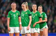 9 April 2024; Republic of Ireland players, from left, Caitlin Hayes, Louise Quinn, Anna Patten and Ruesha Littlejohn await a free kick during the UEFA Women's European Championship qualifying group A match between Republic of Ireland and England at Aviva Stadium in Dublin. Photo by Stephen McCarthy/Sportsfile