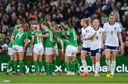 9 April 2024; Republic of Ireland players huddle after England scored their second goal during the UEFA Women's European Championship qualifying group A match between Republic of Ireland and England at Aviva Stadium in Dublin. Photo by Stephen McCarthy/Sportsfile