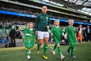 9 April 2024; Republic of Ireland captain Katie McCabe leads her side onto the pitch before the UEFA Women's European Championship qualifying group A match between Republic of Ireland and England at Aviva Stadium in Dublin. Photo by Stephen McCarthy/Sportsfile