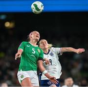 9 April 2024; Caitlin Hayes of Republic of Ireland in action against Alessia Russo of England during the UEFA Women's European Championship qualifying group A match between Republic of Ireland and England at Aviva Stadium in Dublin. Photo by Ramsey Cardy/Sportsfile