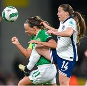 9 April 2024; Katie McCabe of Republic of Ireland is tackled by Fran Kirby of England during the UEFA Women's European Championship qualifying group A match between Republic of Ireland and England at Aviva Stadium in Dublin. Photo by Stephen McCarthy/Sportsfile