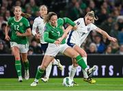 9 April 2024; Megan Campbell of Republic of Ireland in action against Alessia Russo of England during the UEFA Women's European Championship qualifying group A match between Republic of Ireland and England at Aviva Stadium in Dublin. Photo by Ramsey Cardy/Sportsfile