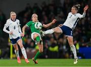 9 April 2024; Lucy Bronze of England in action against Denise O'Sullivan of Republic of Ireland during the UEFA Women's European Championship qualifying group A match between Republic of Ireland and England at Aviva Stadium in Dublin. Photo by Stephen McCarthy/Sportsfile