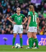 9 April 2024; Denise O'Sullivan, left, and Kyra Carusa of Republic of Ireland during the UEFA Women's European Championship qualifying group A match between Republic of Ireland and England at Aviva Stadium in Dublin. Photo by Stephen McCarthy/Sportsfile