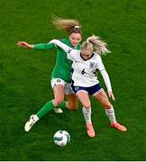 9 April 2024; Alex Greenwood of England in action against Leanne Kiernan of Republic of Ireland during the UEFA Women's European Championship qualifying group A match between Republic of Ireland and England at Aviva Stadium in Dublin. Photo by Tyler Miller/Sportsfile