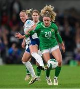 9 April 2024; Leanne Kiernan of Republic of Ireland is tackled by Beth Mead of England during the UEFA Women's European Championship qualifying group A match between Republic of Ireland and England at Aviva Stadium in Dublin. Photo by Stephen McCarthy/Sportsfile