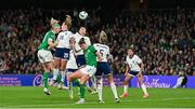 9 April 2024; Louise Quinn of Republic of Ireland in action against Georgia Stanway and Lucy Bronze of England during the UEFA Women's European Championship qualifying group A match between Republic of Ireland and England at Aviva Stadium in Dublin. Photo by Stephen McCarthy/Sportsfile