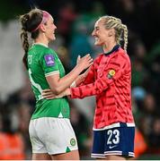 9 April 2024; Caitlin Hayes of Republic of Ireland, left, and Millie Turner of England greet each other after the UEFA Women's European Championship qualifying group A match between Republic of Ireland and England at Aviva Stadium in Dublin. Photo by Ramsey Cardy/Sportsfile