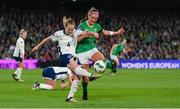 9 April 2024; Keira Walsh of England in action against Caitlin Hayes of Republic of Ireland during the UEFA Women's European Championship qualifying group A match between Republic of Ireland and England at Aviva Stadium in Dublin. Photo by Stephen McCarthy/Sportsfile
