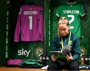 9 April 2024; Jessie Stapleton of Republic of Ireland reads the match programme in their dressing room before the UEFA Women's European Championship qualifying group A match between Republic of Ireland and England at Aviva Stadium in Dublin. Photo by Stephen McCarthy/Sportsfile
