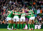9 April 2024; Republic of Ireland players huddle before the UEFA Women's European Championship qualifying group A match between Republic of Ireland and England at Aviva Stadium in Dublin. Photo by Stephen McCarthy/Sportsfile
