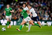 9 April 2024; Katie McCabe of Republic of Ireland in action against Lucy Bronze of England during the UEFA Women's European Championship qualifying group A match between Republic of Ireland and England at Aviva Stadium in Dublin. Photo by Stephen McCarthy/Sportsfile