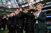 9 April 2024; Republic of Ireland head coach Eileen Gleeson with coaches, from right, assistant coach Emma Byrne, assistant coach Stephen Rice and assistant coach Rhys Carr after the playing of the National Anthem before the UEFA Women's European Championship qualifying group A match between Republic of Ireland and England at Aviva Stadium in Dublin. Photo by Stephen McCarthy/Sportsfile
