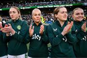 9 April 2024; Republic of Ireland players, from left, Megan Connolly, Lily Agg, Tyler Toland and Izzy Atkinson before the UEFA Women's European Championship qualifying group A match between Republic of Ireland and England at Aviva Stadium in Dublin. Photo by Stephen McCarthy/Sportsfile