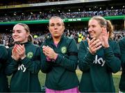 9 April 2024; Republic of Ireland players, from left, Izzy Atkinson, Grace Moloney and Sophie Whitehouse before the UEFA Women's European Championship qualifying group A match between Republic of Ireland and England at Aviva Stadium in Dublin. Photo by Stephen McCarthy/Sportsfile