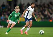 9 April 2024; Jessica Carter of England in action against Leanne Kiernan of Republic of Ireland during the UEFA Women's European Championship qualifying group A match between Republic of Ireland and England at Aviva Stadium in Dublin. Photo by Stephen McCarthy/Sportsfile