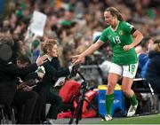 9 April 2024; Kyra Carusa of Republic of Ireland with head coach Eileen Gleeson during the UEFA Women's European Championship qualifying group A match between Republic of Ireland and England at Aviva Stadium in Dublin. Photo by Stephen McCarthy/Sportsfile