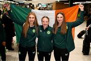 10 April 2024; Republic of Ireland players, from left, Ellen Dolan, Freya Healy and Jess Fitzgerald, all from the Peamount United club, on the team's arrival at Dublin Airport from Croatia where the Republic of Ireland Women's U19 squad qualified for July's UEFA Women's U19 European Championships to be held in Lithuania. Photo by Stephen McCarthy/Sportsfile