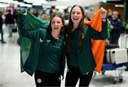 10 April 2024; Republic of Ireland's Meabh Russell, left, and Kate Thompson on the team's arrival at Dublin Airport from Croatia where the Republic of Ireland Women's U19 squad qualified for July's UEFA Women's U19 European Championships to be held in Lithuania. Photo by Stephen McCarthy/Sportsfile