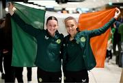10 April 2024; Republic of Ireland's Hannah Healy, left, and Jodie Loughrey on the team's arrival at Dublin Airport from Croatia where the Republic of Ireland Women's U19 squad qualified for July's UEFA Women's U19 European Championships to be held in Lithuania. Photo by Stephen McCarthy/Sportsfile